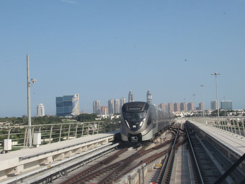 A Doha Metro train on an elevated stretch of the Red Line