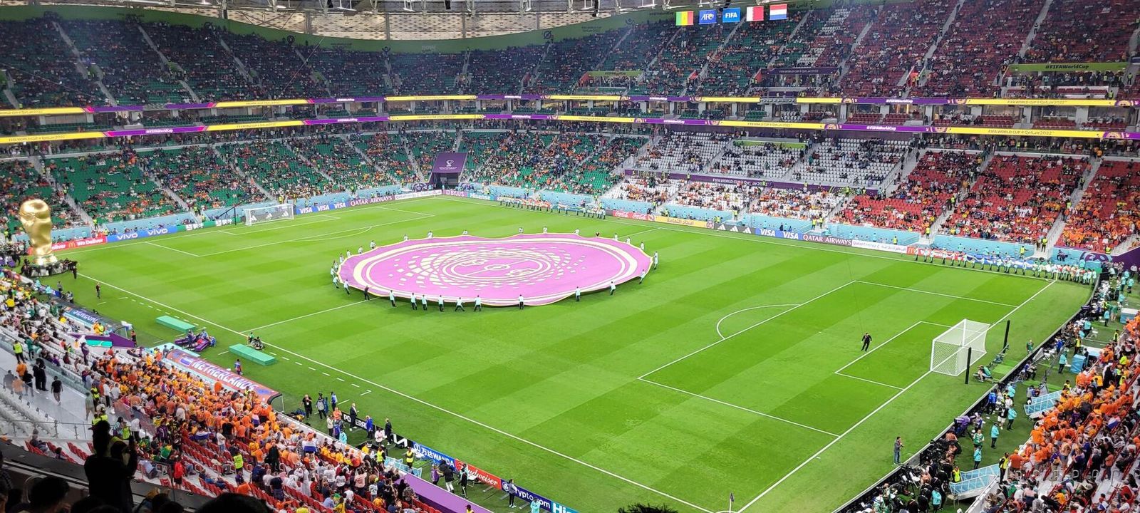 Pre-match ceremony on the pitch at Al Thumama Stadium, with packed stands all around, during the 2022 World Cup